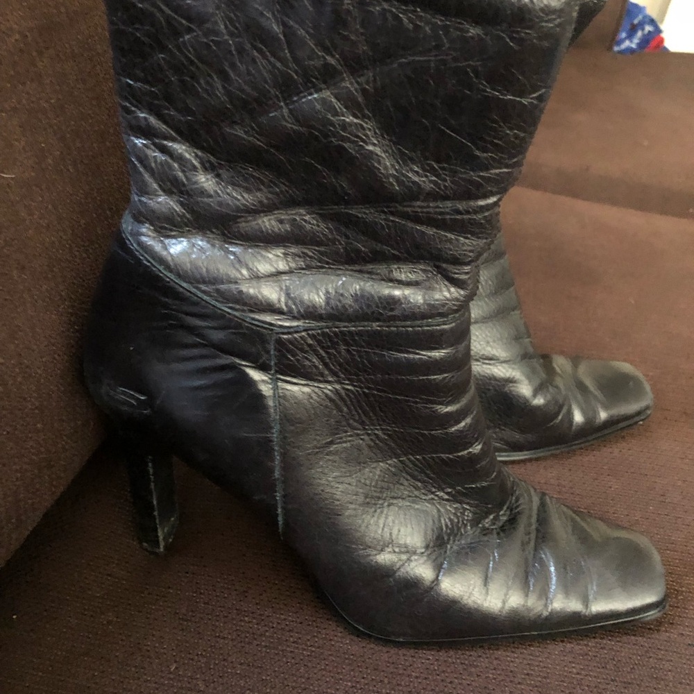 Womens Skechers Brand high heel boots.